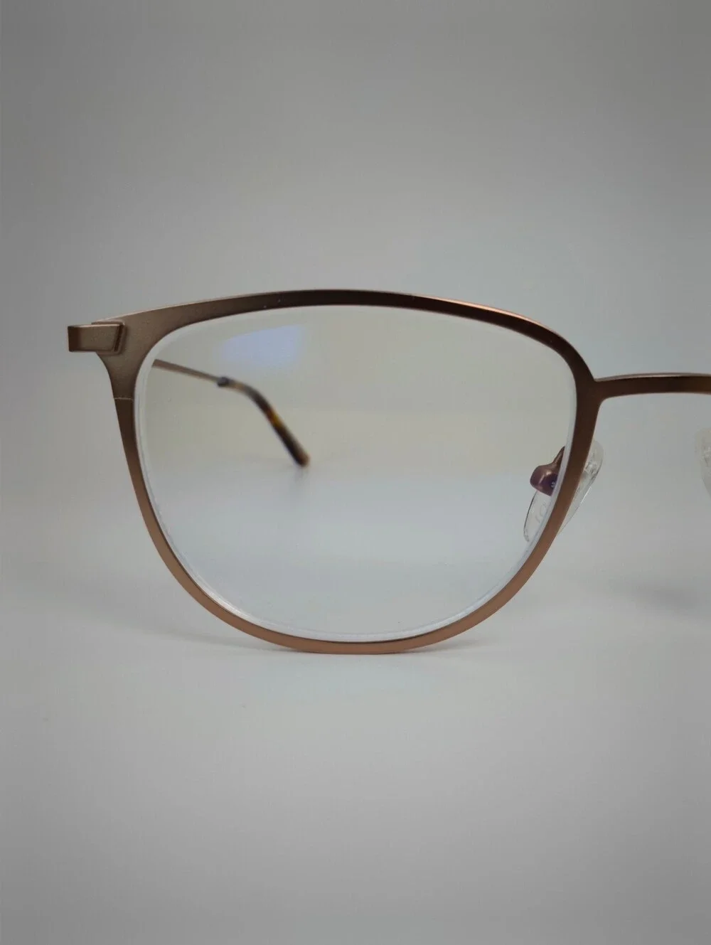 Vita. Metal Frame Eyeglasses in Copper Brown. Tortoise Temple Tips.